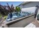 Relaxing hot tub with privacy features in a well-maintained backyard setting at 3311 Stoddard Pl, Indianapolis, IN 46217