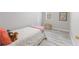 View of a bedroom with neutral walls, a wood floor, and a comfy bed at 3331 Graceland Ave, Indianapolis, IN 46208