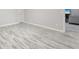 Bright bedroom with light wood floor, fresh paint, and easy access to living room at 3331 Graceland Ave, Indianapolis, IN 46208