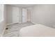 This bedroom showcases wood floors, neutral walls, and two closets for storage at 3331 Graceland Ave, Indianapolis, IN 46208