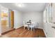 Cozy dining room features hardwood floors and neutral walls at 3331 Graceland Ave, Indianapolis, IN 46208