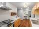 Open kitchen layout with stainless steel appliances and ample cabinet space at 3331 Graceland Ave, Indianapolis, IN 46208