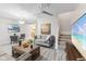 Inviting living room with great natural light, wood floors, and stylish furniture at 3331 Graceland Ave, Indianapolis, IN 46208