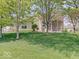View of the home's backyard featuring a patio with outdoor furniture and a grill, perfect for entertaining at 3480 Limelight Ln, Whitestown, IN 46075