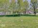 View of the level backyard with mature trees and privacy that's ideal for or pets to play at 3480 Limelight Ln, Whitestown, IN 46075