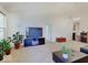 Spacious living room featuring neutral carpet and natural lighting, creating a comfortable gathering space at 3480 Limelight Ln, Whitestown, IN 46075