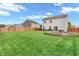 Spacious backyard featuring a patio area and a fire pit, perfect for outdoor relaxation at 401 Shadetree Ln, Sheridan, IN 46069
