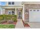 Close-up of the front entrance with charming details and well-maintained landscaping at 401 Shadetree Ln, Sheridan, IN 46069