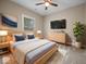 Bedroom with a bed, two nightstands, a dresser, and a ceiling fan at 403 Fox Ridge Ct, Shelbyville, IN 46176
