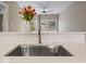 Stylish kitchen featuring a stainless steel sink, modern faucet, and white quartz countertop at 403 Fox Ridge Ct, Shelbyville, IN 46176