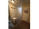 Upstairs hallway with neutral walls and access to multiple rooms at 4402 Mountbatten Ct, Indianapolis, IN 46254