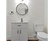 Bathroom features wood-look floors and a modern floating vanity at 4475 Berkshire Rd, Indianapolis, IN 46226
