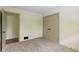 Bedroom with neutral walls, two closet doors, neutral carpet and white trim at 4475 Berkshire Rd, Indianapolis, IN 46226