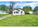 Well-maintained home with a lush green lawn, offering a blend of comfort and classic charm at 4941 Mathews Ave, Indianapolis, IN 46227