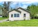 Charming bungalow featuring vinyl siding, a tidy front lawn, and a cozy, welcoming exterior at 4941 Mathews Ave, Indianapolis, IN 46227