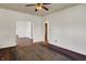 The living room features beautiful wood floors, multiple doorways, and bright natural light at 4941 Mathews Ave, Indianapolis, IN 46227