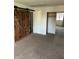 Spacious bedroom with a barn door and large closet at 4984 W 59Th St, Indianapolis, IN 46254
