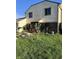 Two-story home boasting a well-maintained lawn, brick foundation, and inviting curb appeal at 4984 W 59Th St, Indianapolis, IN 46254