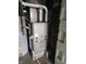 Basement featuring a new furnace, brick walls, and concrete foundation at 5103 W Vermont St, Indianapolis, IN 46224