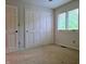 Cozy bedroom featuring sliding door closet and carpet at 515 E Hoover Dr, Nineveh, IN 46164