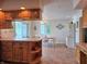 Bright dining area with patio access and view to backyard, adjacent to the kitchen at 515 E Hoover Dr, Nineveh, IN 46164