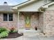 Elegant front entrance with decorative glass door and brick facade at 515 E Hoover Dr, Nineveh, IN 46164