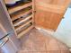 View of custom pull out shelves in the kitchen cabinet at 515 E Hoover Dr, Nineveh, IN 46164