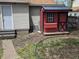 Backyard area featuring a small shed adjacent to a residence and an AC condenser at 533 W Pike St, Martinsville, IN 46151