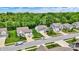 Aerial view of well-maintained homes and tree-lined streets in a peaceful neighborhood at 5580 Pintail Ln, Greenwood, IN 46143
