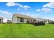 Large backyard with a lovely deck, perfect for enjoying outdoor living and entertaining at 5580 Pintail Ln, Greenwood, IN 46143