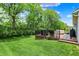 Spacious deck in backyard with trees, great for entertaining and enjoying the outdoors at 5580 Pintail Ln, Greenwood, IN 46143