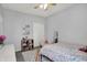 Cozy bedroom with bright decor, a ceiling fan, and ample space at 5580 Pintail Ln, Greenwood, IN 46143