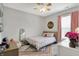Bright bedroom with colorful decor, a ceiling fan, and plenty of natural light at 5580 Pintail Ln, Greenwood, IN 46143