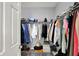 Walk-in closet with ample hanging space and shelving for organized storage at 5580 Pintail Ln, Greenwood, IN 46143