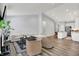 Spacious living room leading into the kitchen, with hardwood floors and ample natural light at 5580 Pintail Ln, Greenwood, IN 46143