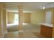 Spacious basement featuring neutral walls, carpet, and walk out at 5708 Outer Bank Rd, Indianapolis, IN 46239