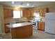 Open kitchen featuring an island, and modern appliances at 5708 Outer Bank Rd, Indianapolis, IN 46239