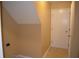 Room with access door to utility connections and a white door at 5708 Outer Bank Rd, Indianapolis, IN 46239