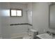 Updated bathroom with white subway tile, modern fixtures, and a sleek vanity at 5979 S Walcott St, Indianapolis, IN 46227