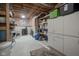 Unfinished basement area with shelving, plumbing, and storage space at 6270 Lancaster Pl, Zionsville, IN 46077