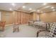 Finished basement with a ping pong table and a wood accent wall at 6270 Lancaster Pl, Zionsville, IN 46077