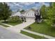 Two-story home with two-car garage, lush lawn, and inviting curb appeal at 6270 Lancaster Pl, Zionsville, IN 46077