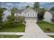 Charming two-story home with a two-car garage, well-manicured lawn, and lovely curb appeal at 6270 Lancaster Pl, Zionsville, IN 46077