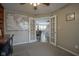 Office with built-ins leading to living area; home features an open floorplan at 6270 Lancaster Pl, Zionsville, IN 46077