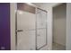 Shower with sliding glass doors and view into the adjacent bathroom at 6270 Lancaster Pl, Zionsville, IN 46077