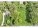 Aerial view of the property showcasing the home, mature trees, and expansive green space at 6340 W 800 S, Pendleton, IN 46064
