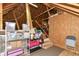 Unfinished attic storage space with wood beams and plywood walls at 6340 W 800 S, Pendleton, IN 46064