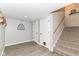 Finished basement area with carpeted stairs and laminate flooring at 6340 W 800 S, Pendleton, IN 46064