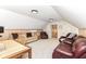 Bright bonus room with cozy seating and space for a playroom or Gathering time at 6340 W 800 S, Pendleton, IN 46064