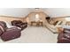 Spacious bonus room featuring a desk, chair, sofa and comfy recliner at 6340 W 800 S, Pendleton, IN 46064